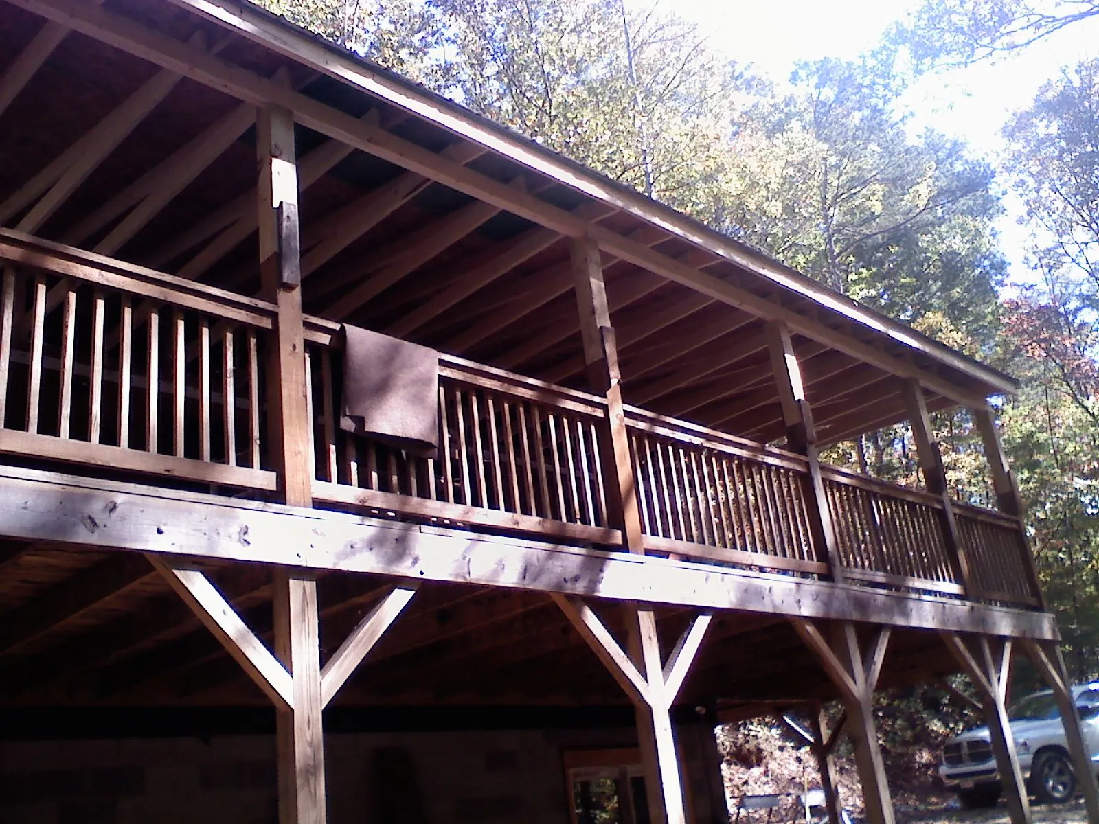 Timber framing under a new elevated porch and deck — Roof Leak Repair in Pataskala by Roofing Brothers